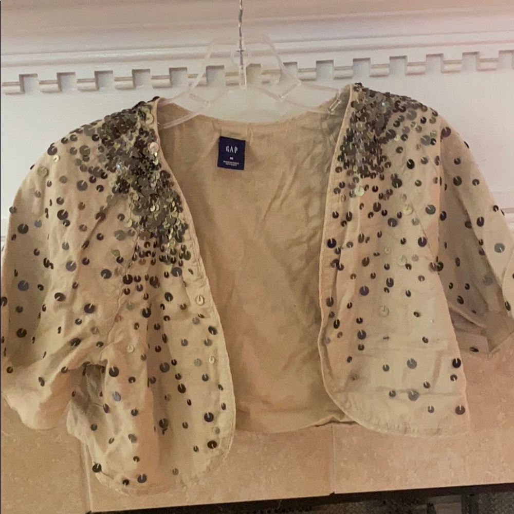 Brown sequined top can be layered or worn w a tank